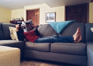 man lounging on the couch